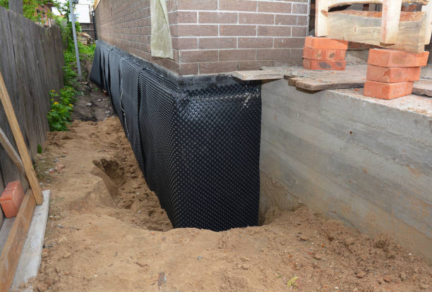 SJ Waterproofing Pros technician performing targeted Sump Pump Installation assessment in Rolling Meadows, IL